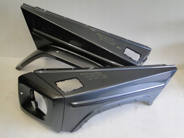 MERCEDES BŁOTNIK PRZEDNI LEWY 63 AMG 041 SZARY G KLASA III W463 463